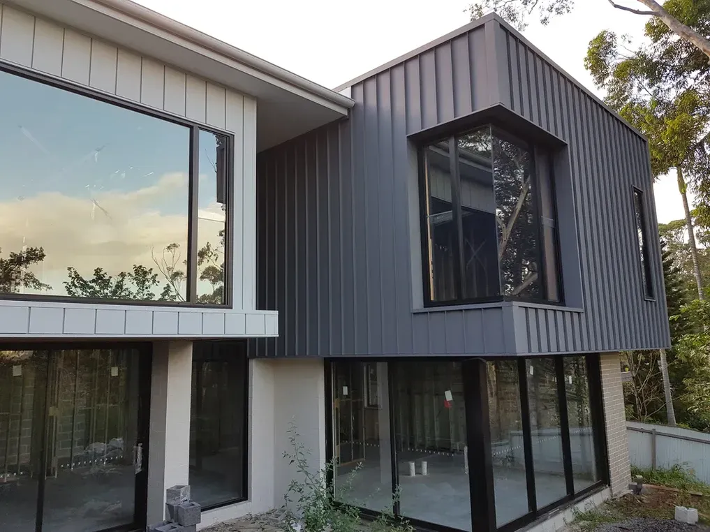 White and Charcoal House Being Built — Builder in Wollongong, NSW