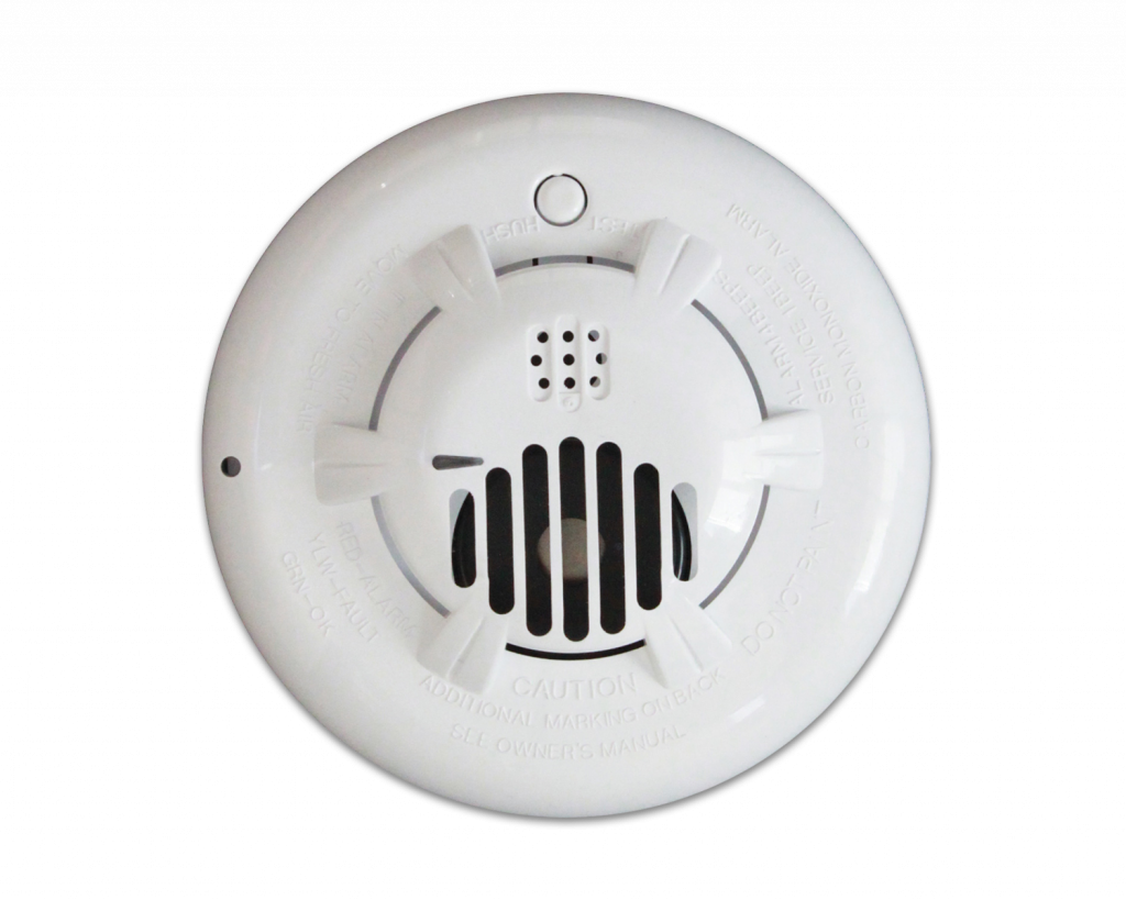 A white smoke detector with black stripes on it