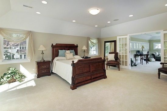 There is a large bed in the middle of the room.