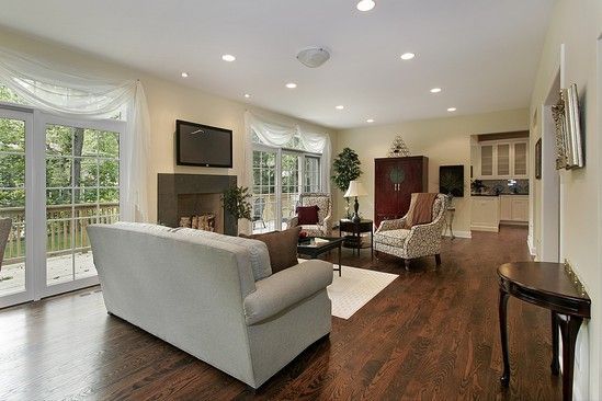 A living room filled with furniture and a fireplace.