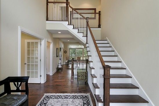 A staircase leading up to the second floor of a house