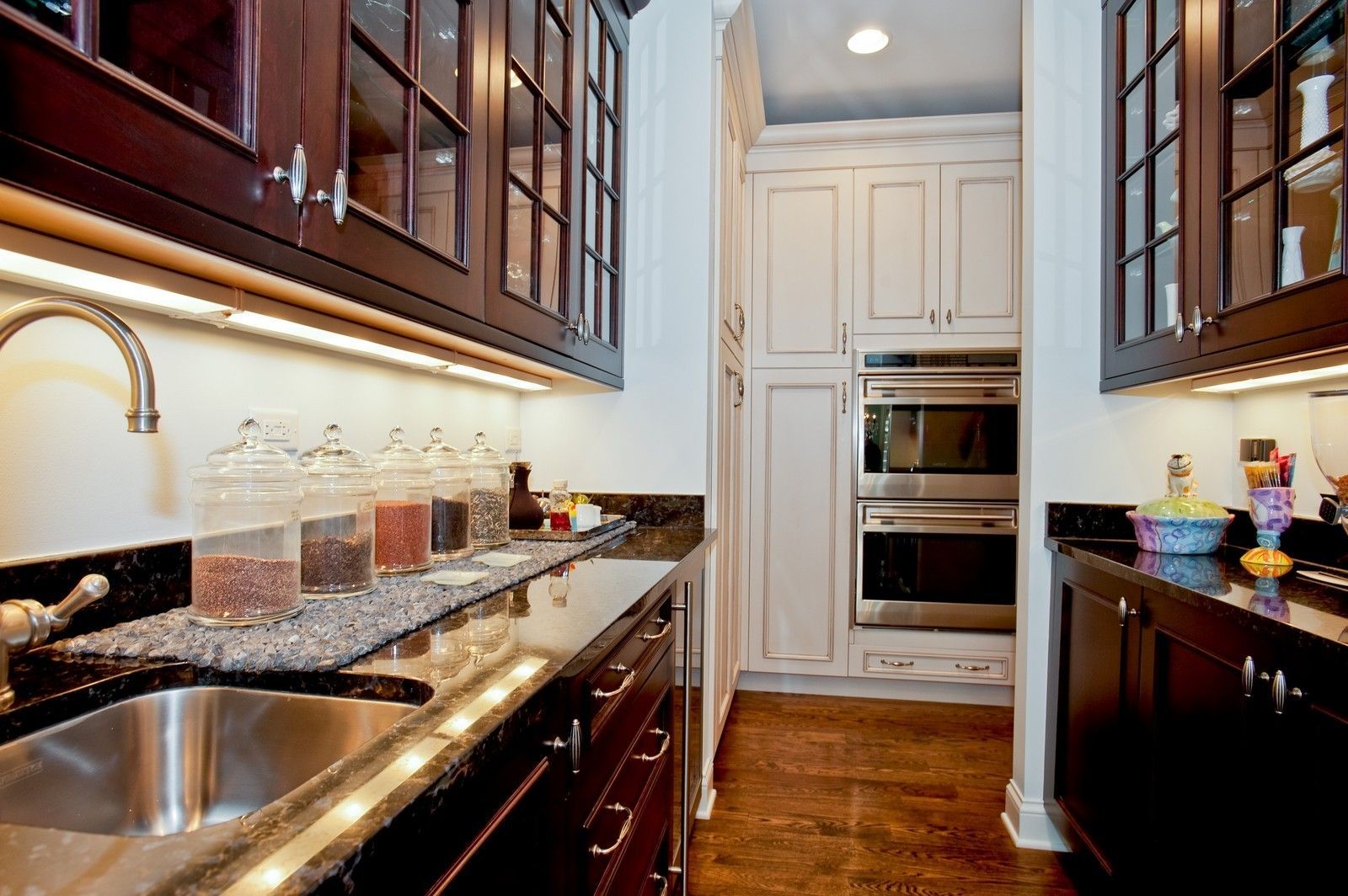 A kitchen with stainless steel appliances and a sink