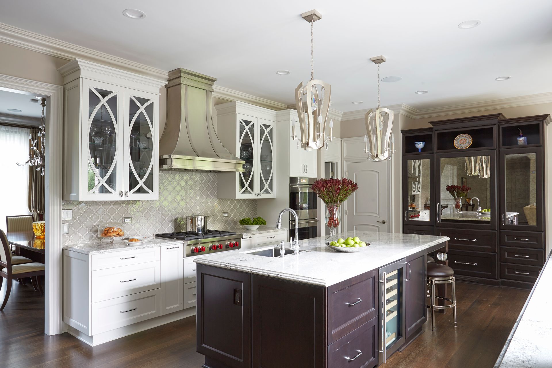 There is a large island in the middle of the kitchen.