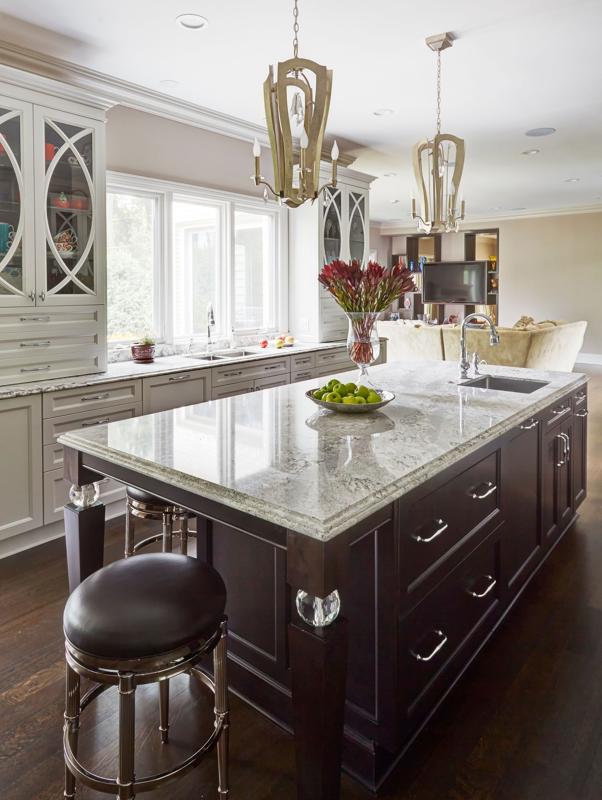 A kitchen with a large island in the middle of it