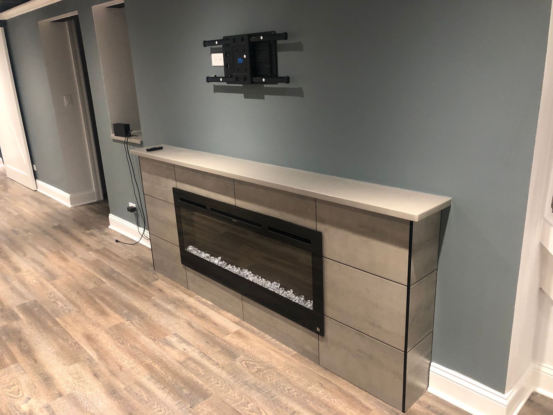 There is a fireplace in the middle of the room.