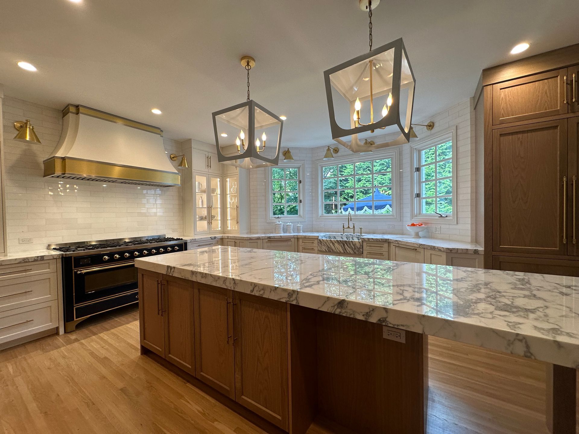There is a large island in the middle of the kitchen.
