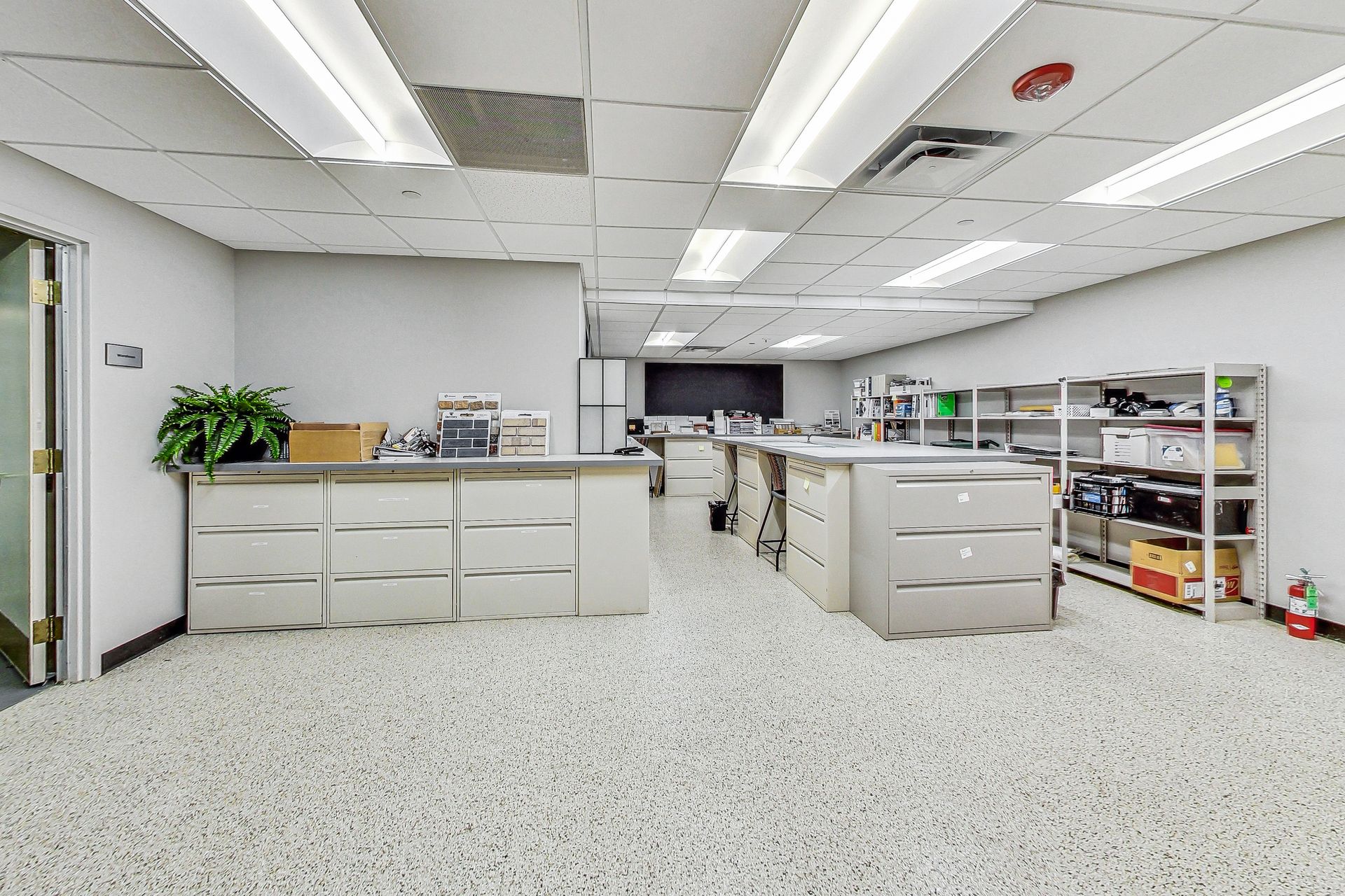 A large room with a lot of cabinets and shelves