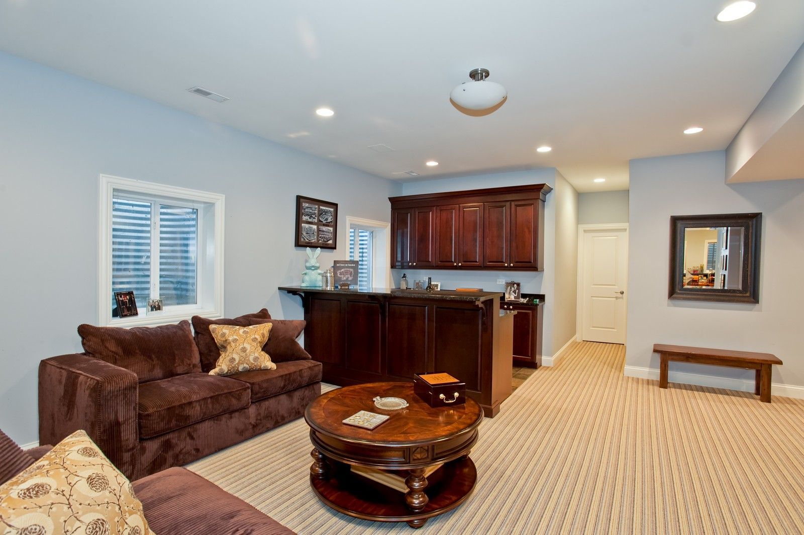 A living room with a couch and a coffee table