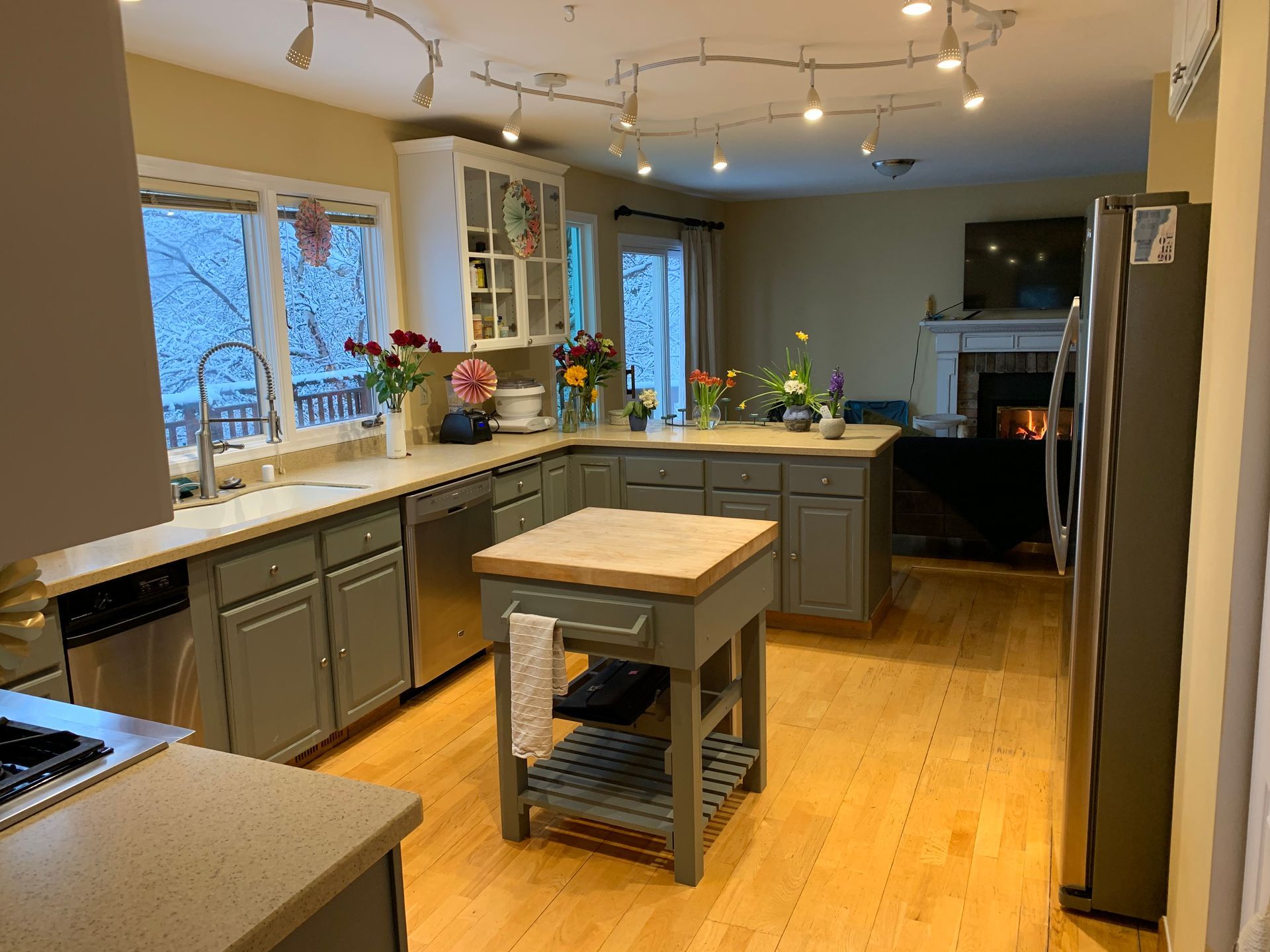 A kitchen with a large island in the middle of it