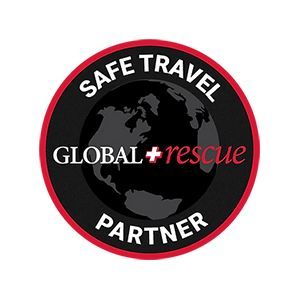 A safe travel global rescue partner logo with a globe in the center