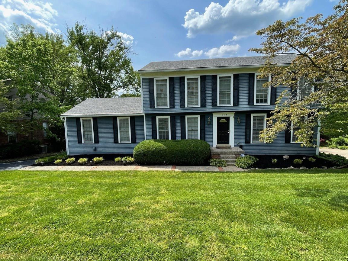 Large House Lush Green Lawn — Louisville, KY — Titan Landscape Group