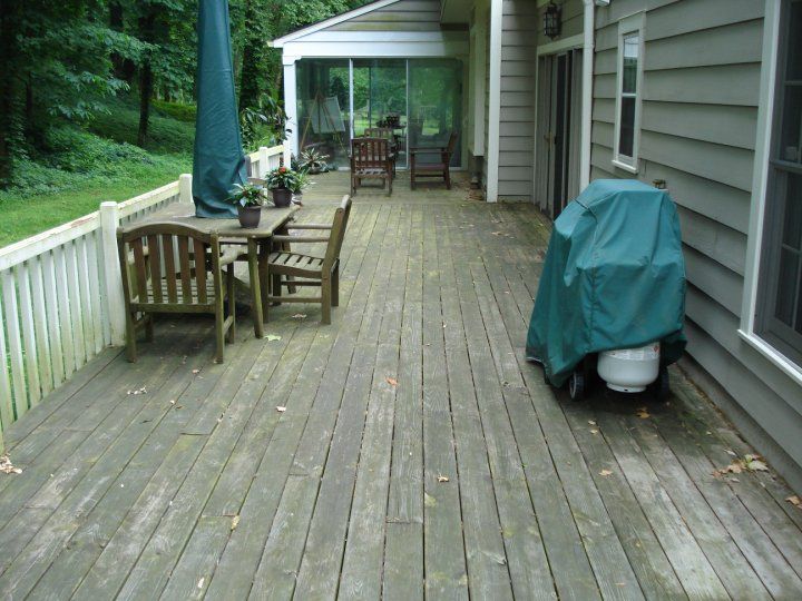 Pressure washing deck before