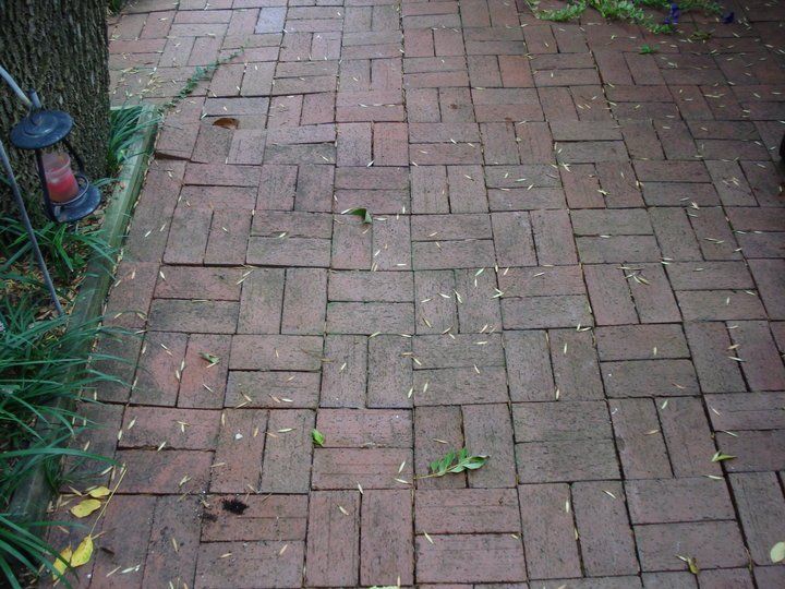 Pressure washing brick before