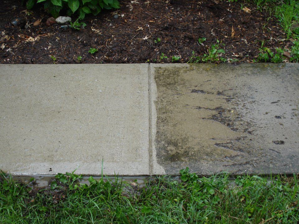 Pressure washing concrete before & after