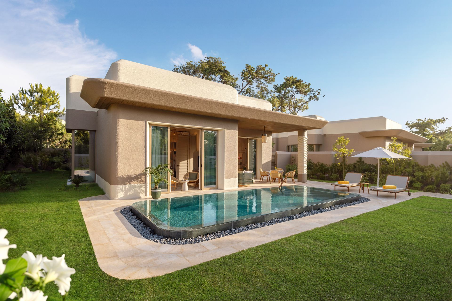 An artist 's impression of a house with a swimming pool in the backyard.