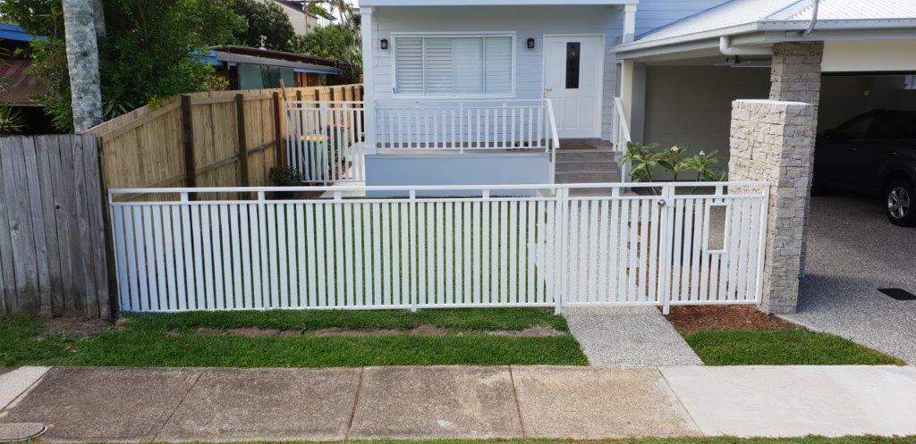 White fence with walk way gate — Fencing Contractor in Burleigh Heads, QLD