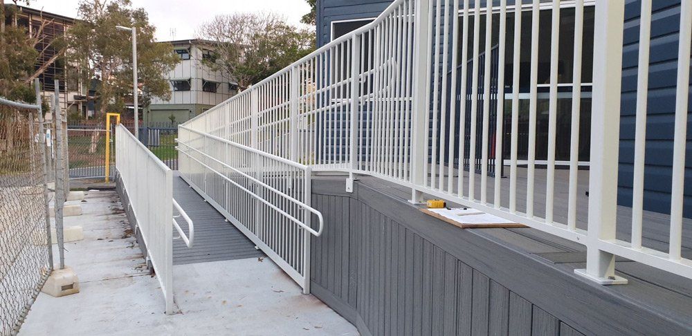 Alumimnum Balustrade With Handrails With Accessible Wheelchair Ramp — Balustrading in Burleigh Heads, QLD