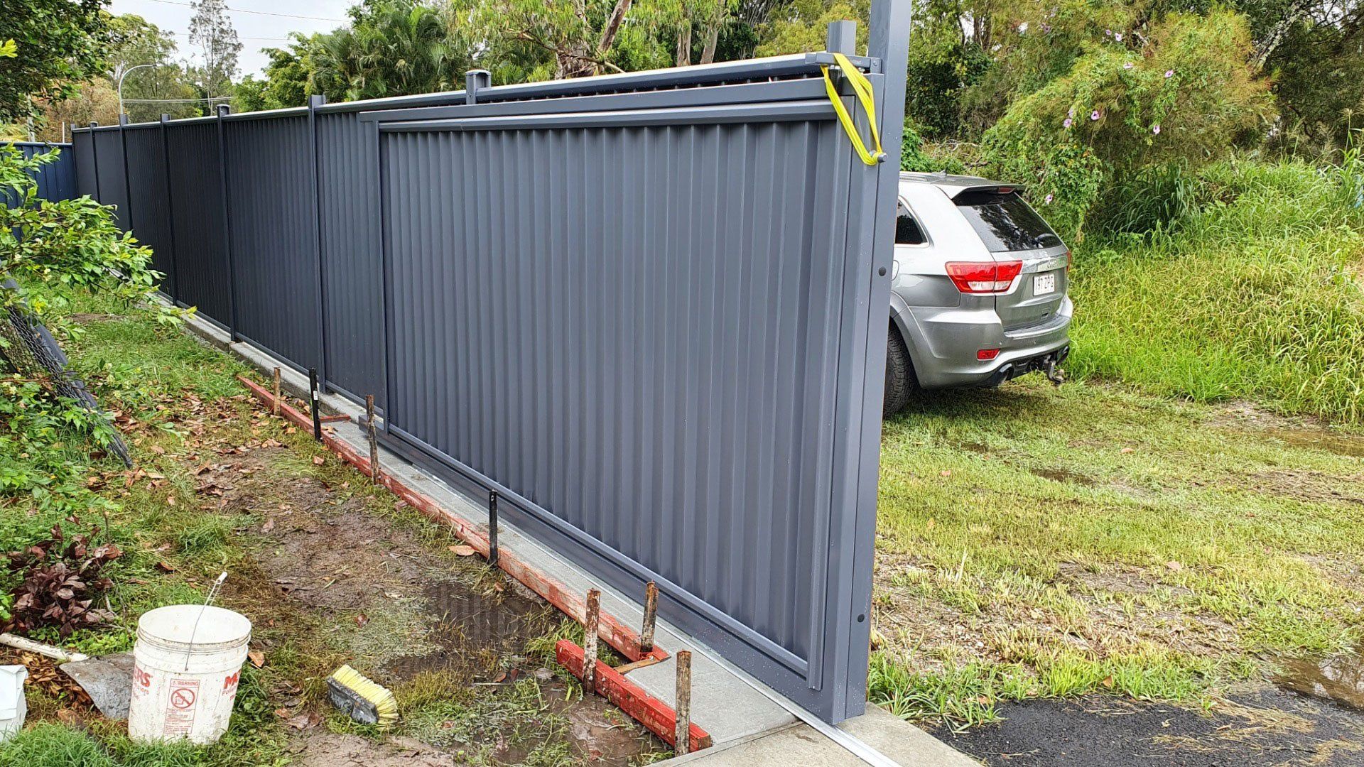 Aluminum-Dark Grey Sliding Gates And Wall — Aluminium Gates in Burleigh Head, QLD