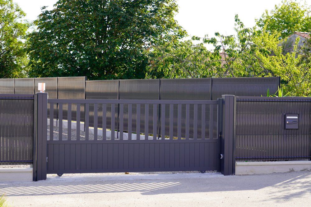Dark grey gate aluminum portal with blades — Aluminium Gates in Burleigh Head, QLD