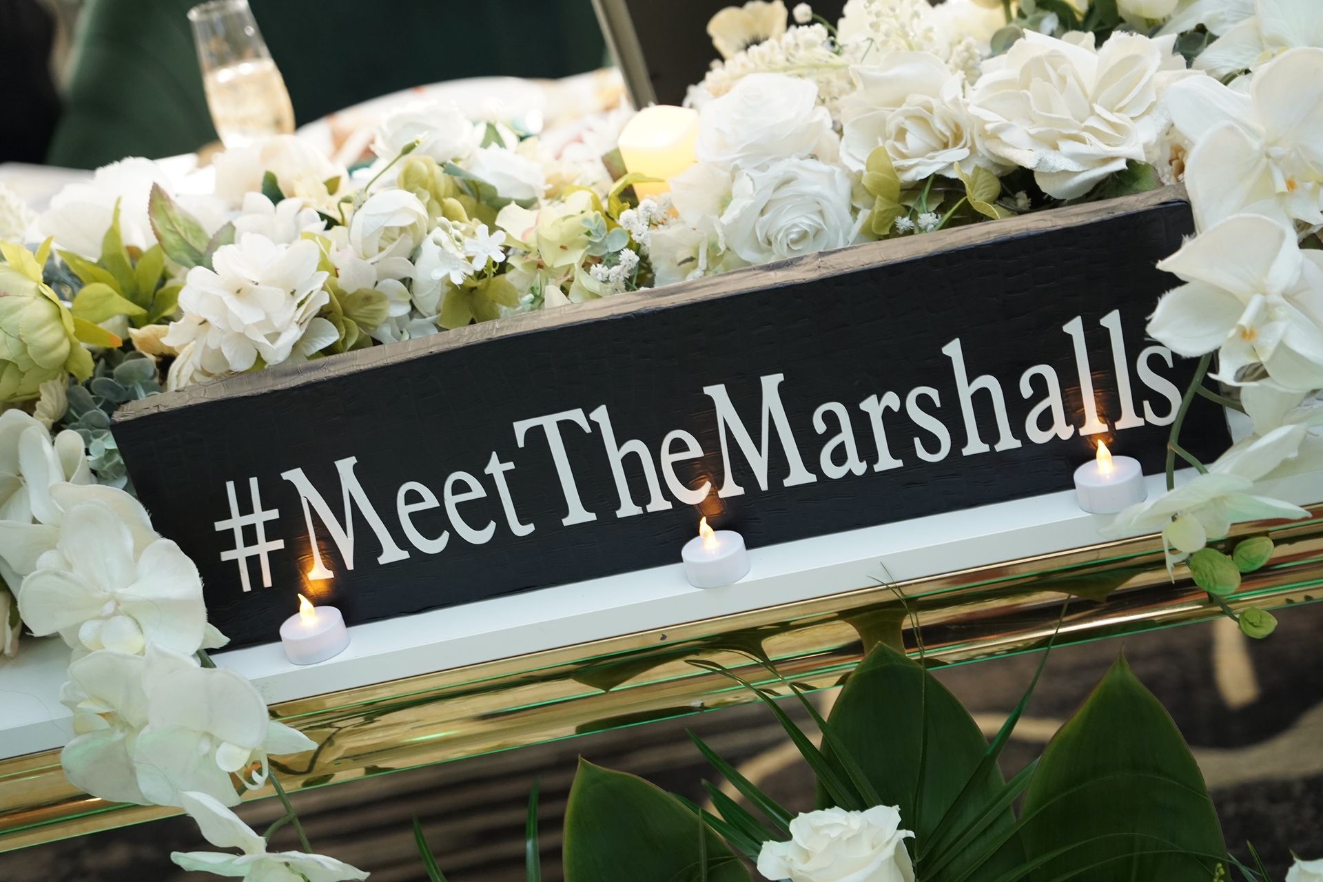 Black sign with white text 