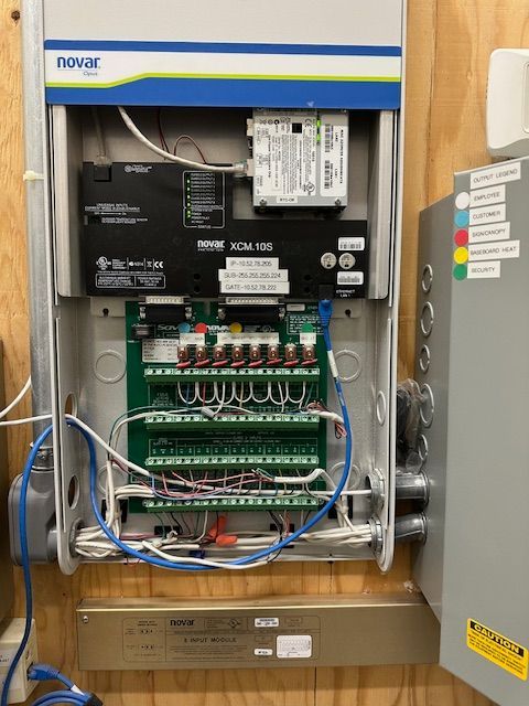 A navor electrical box with a lot of wires coming out of it