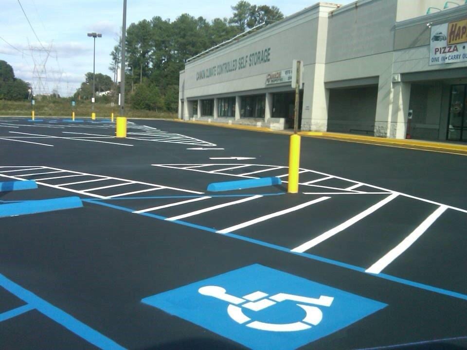 Parking Lot Striping Signs — Chatanooga, TN — Pro-Seal & Paving LLC