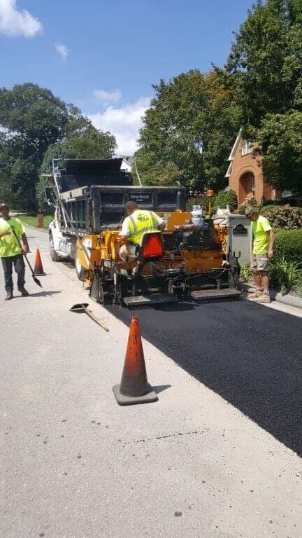 Men Working Asphalt Paving Project — Chatanooga, TN — Pro-Seal & Paving LLC