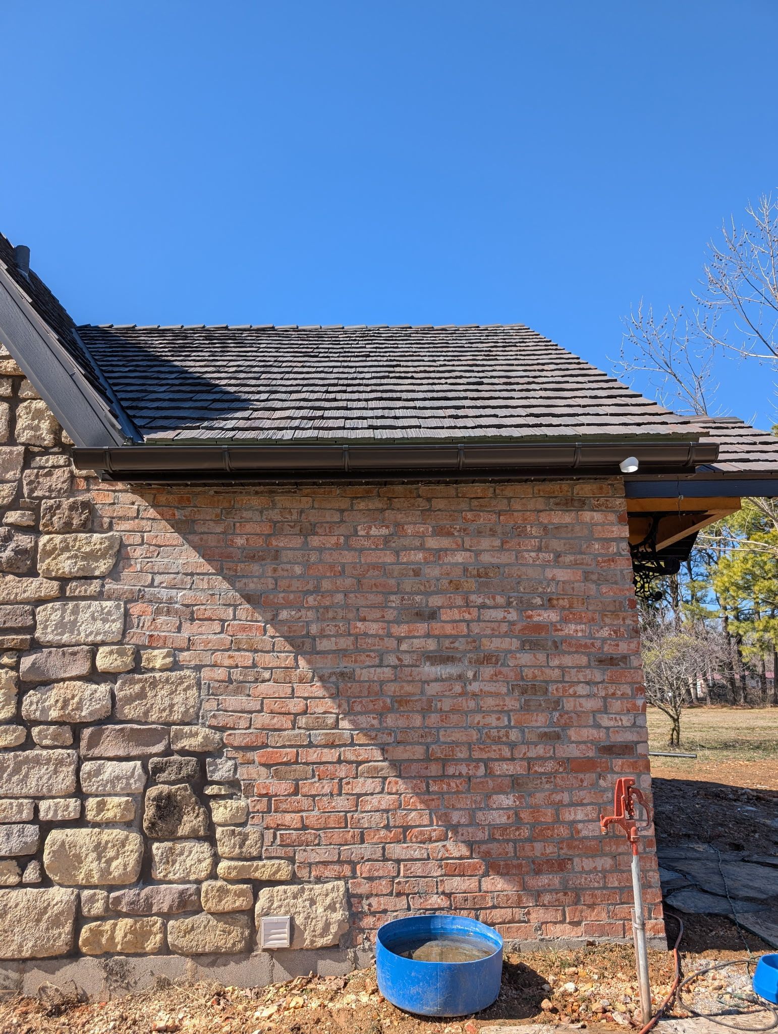 Attic window with new gutters