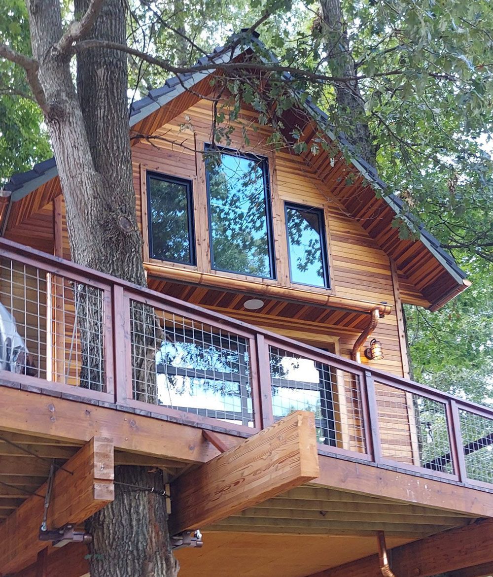 A wooden tree house was a unique gutter project.