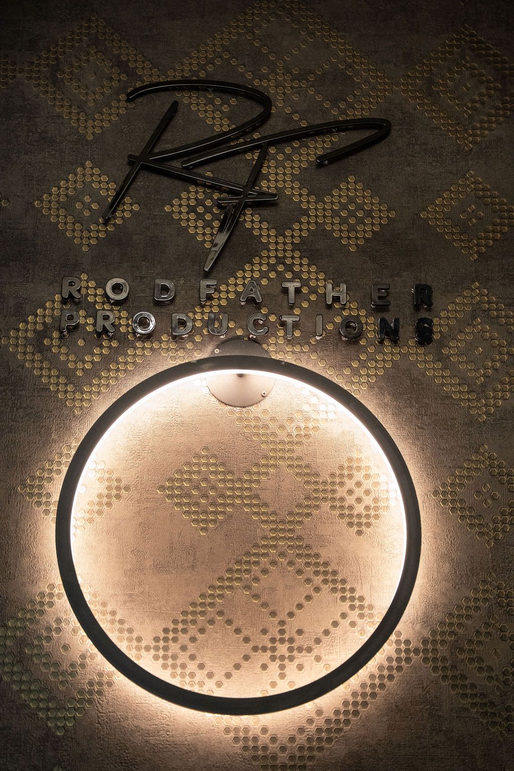 Logo with a circular light and 