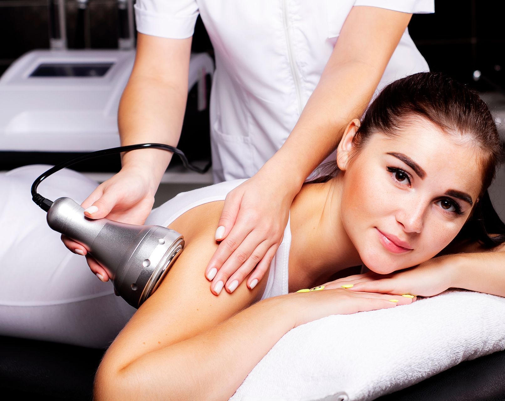 A woman is getting a massage at a spa.