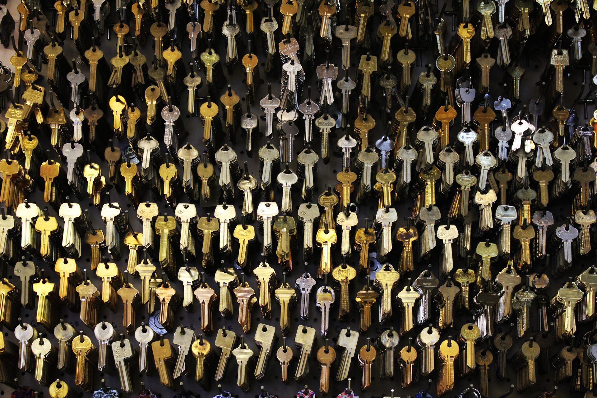 A bunch of keys are lined up in a row.