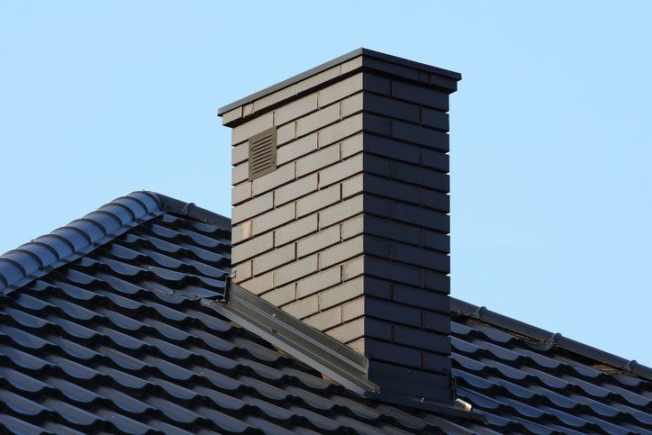 Gray Chimney On Roof — Lawrenceville, GA — A Neat Sweep