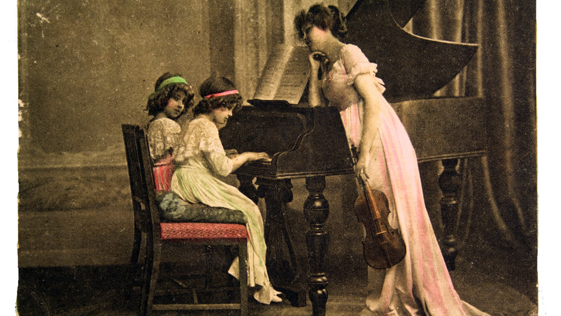 outdoor green piano with flowers growing out of top