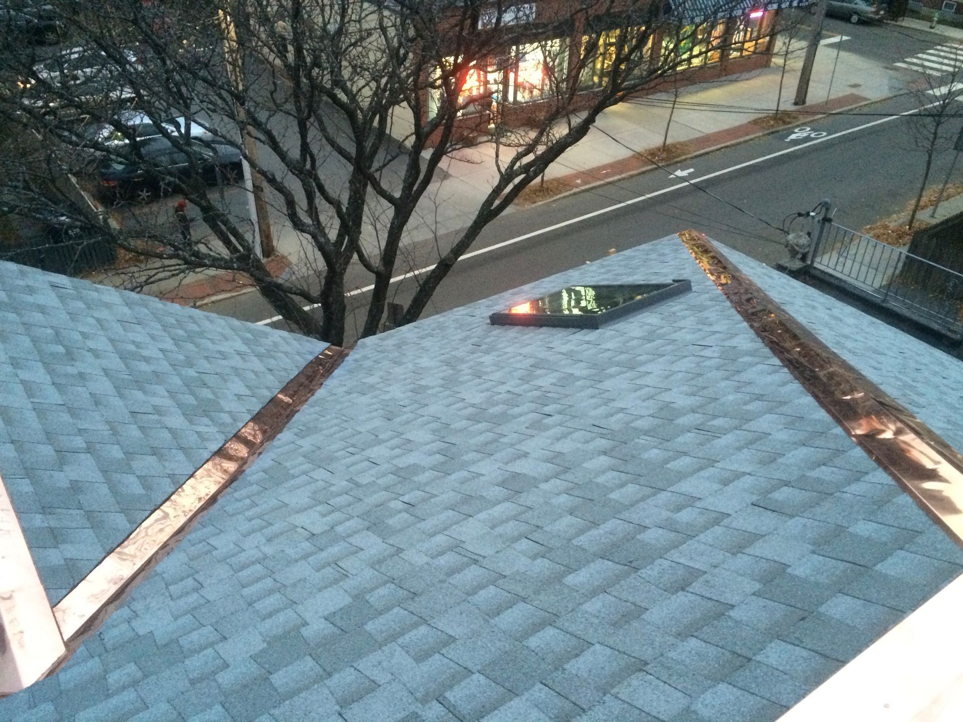 An aerial view of a roof with copper gutters