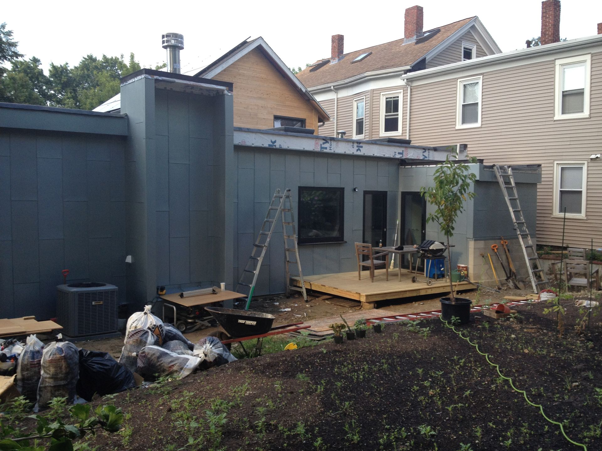 The backyard of a house is being remodeled
