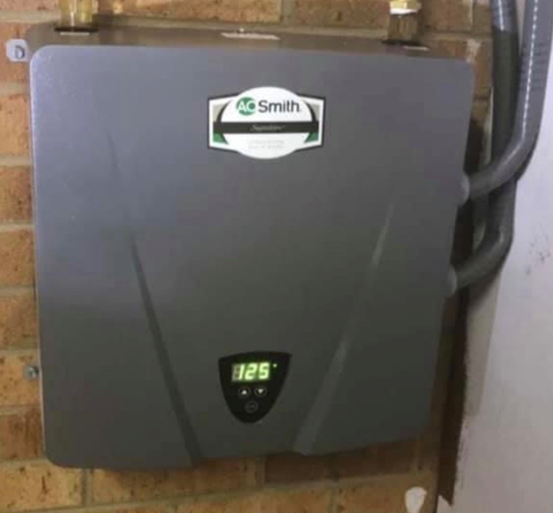 Feet on a Heating Radiator — Danville, VA — KC Plumbing, Heating & A/C