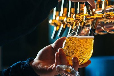 Bartender Pouring Draft Beer In Glass — Carlisle, PA — Stan’s Beverage Distributor