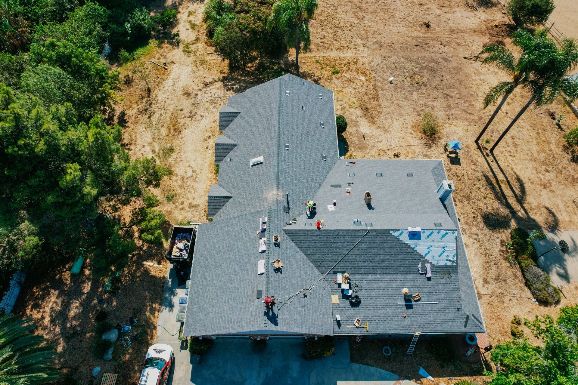 An aerial view of a house that is being remodeled
