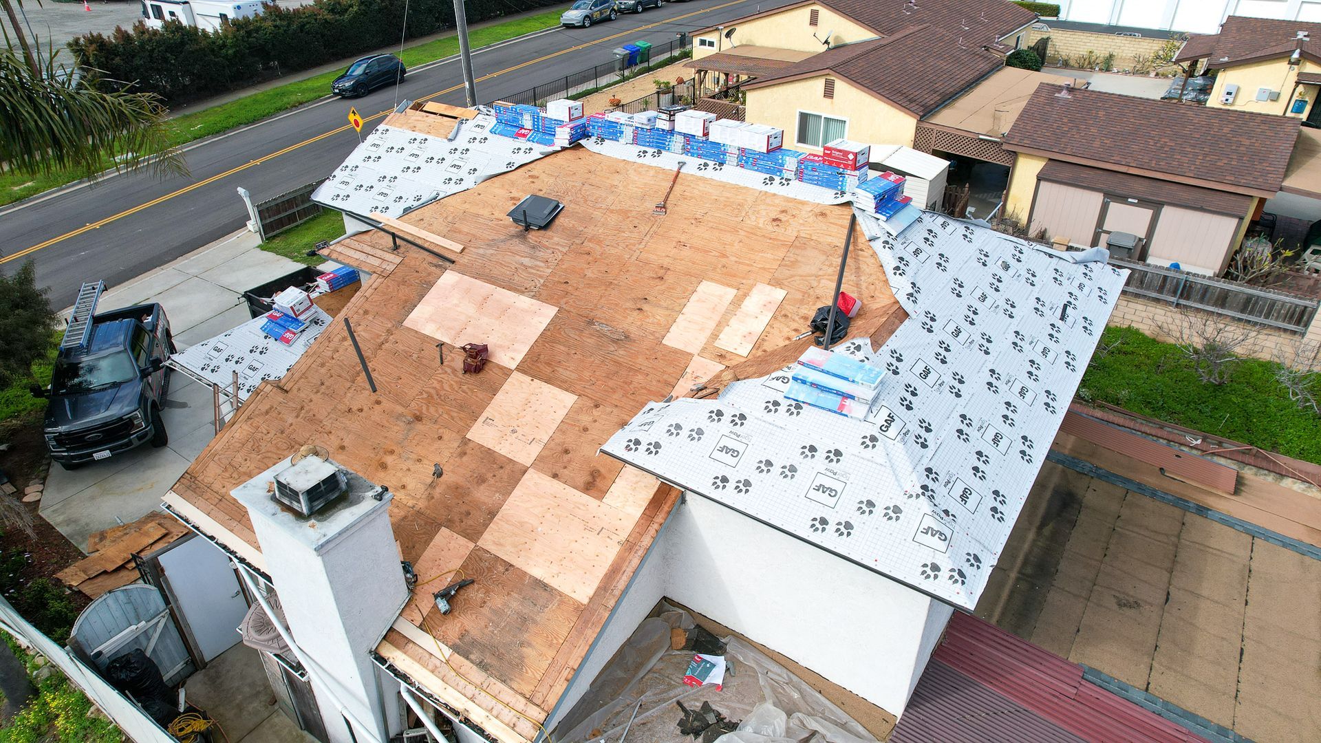 An aerial view of a house that is being remodeled