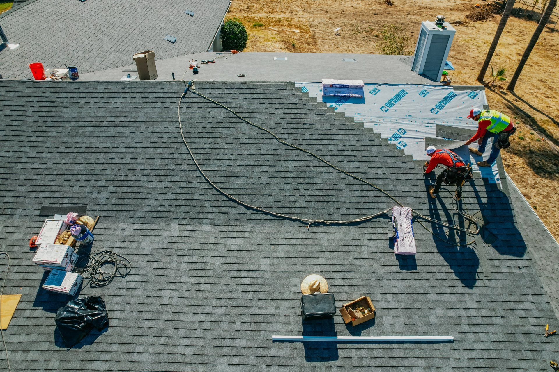 An aerial view of a roof being installed