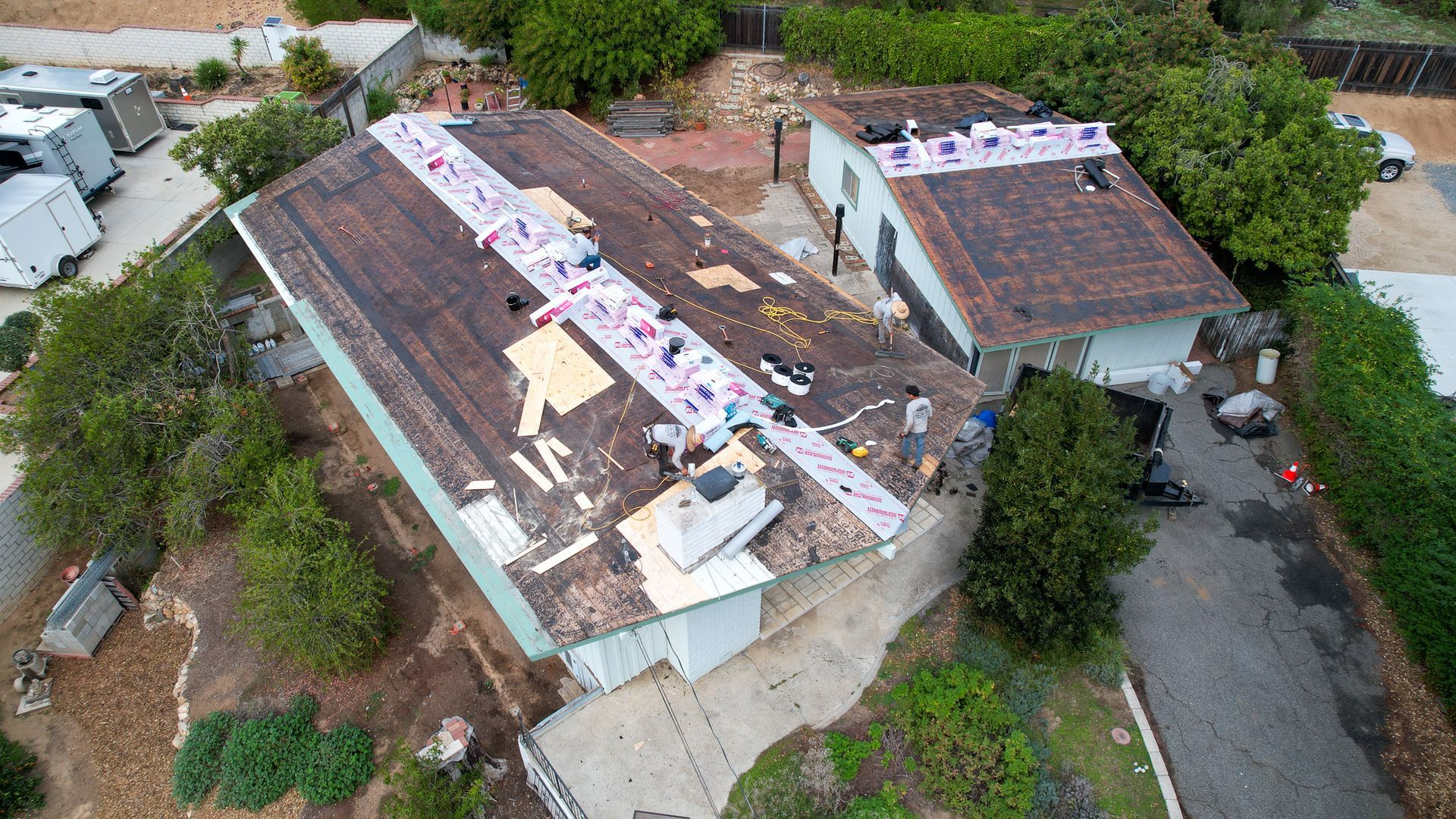 An aerial view of a house that is being remodeled