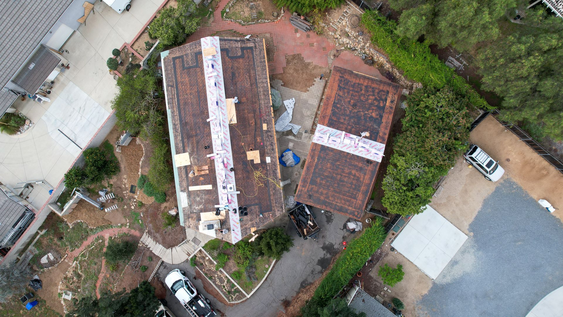 An aerial view of a house that is being remodeled