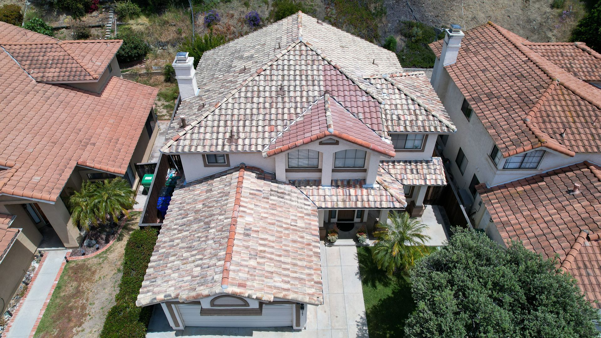 An aerial view of a house with a tiled roof