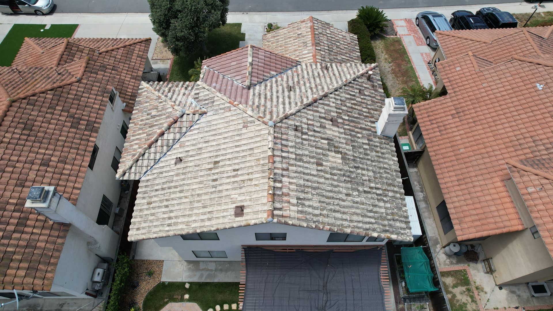 An aerial view of a house with a tiled roof
