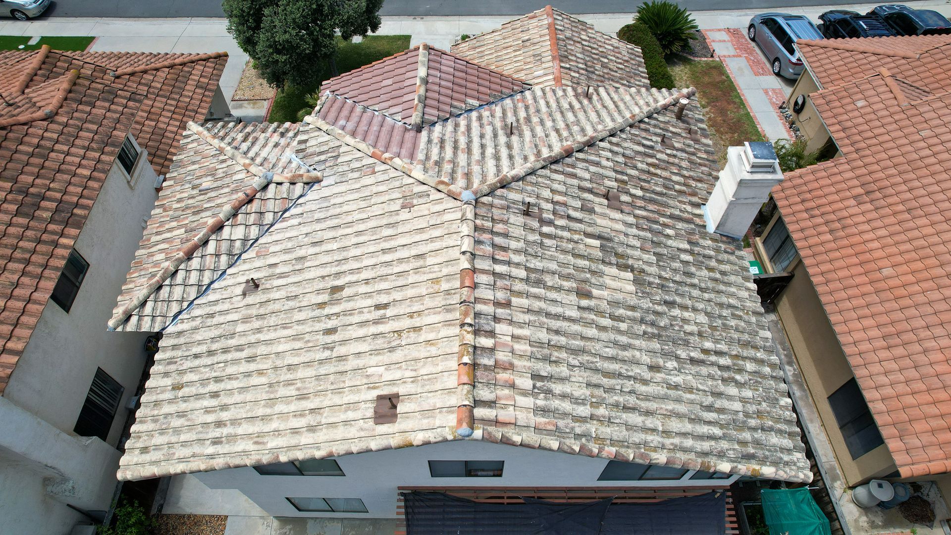 An aerial view of a house with a tiled roof