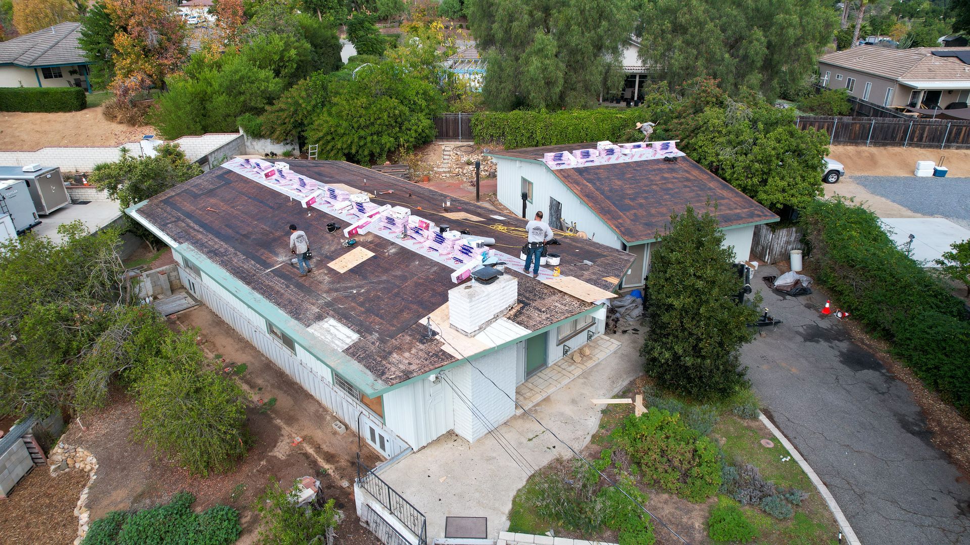 An aerial view of a house that is being remodeled