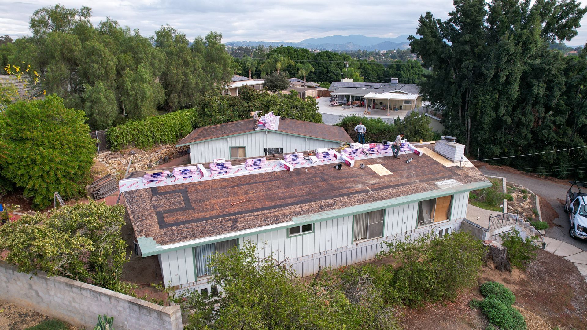 An aerial view of a house that is being remodeled