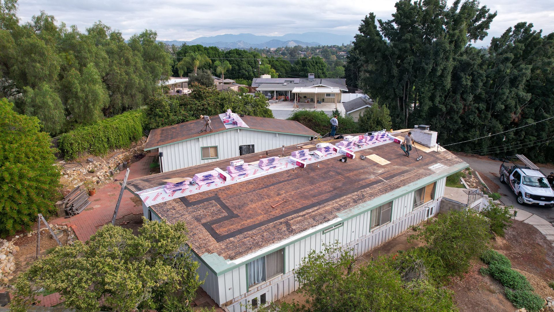An aerial view of a house that is being remodeled