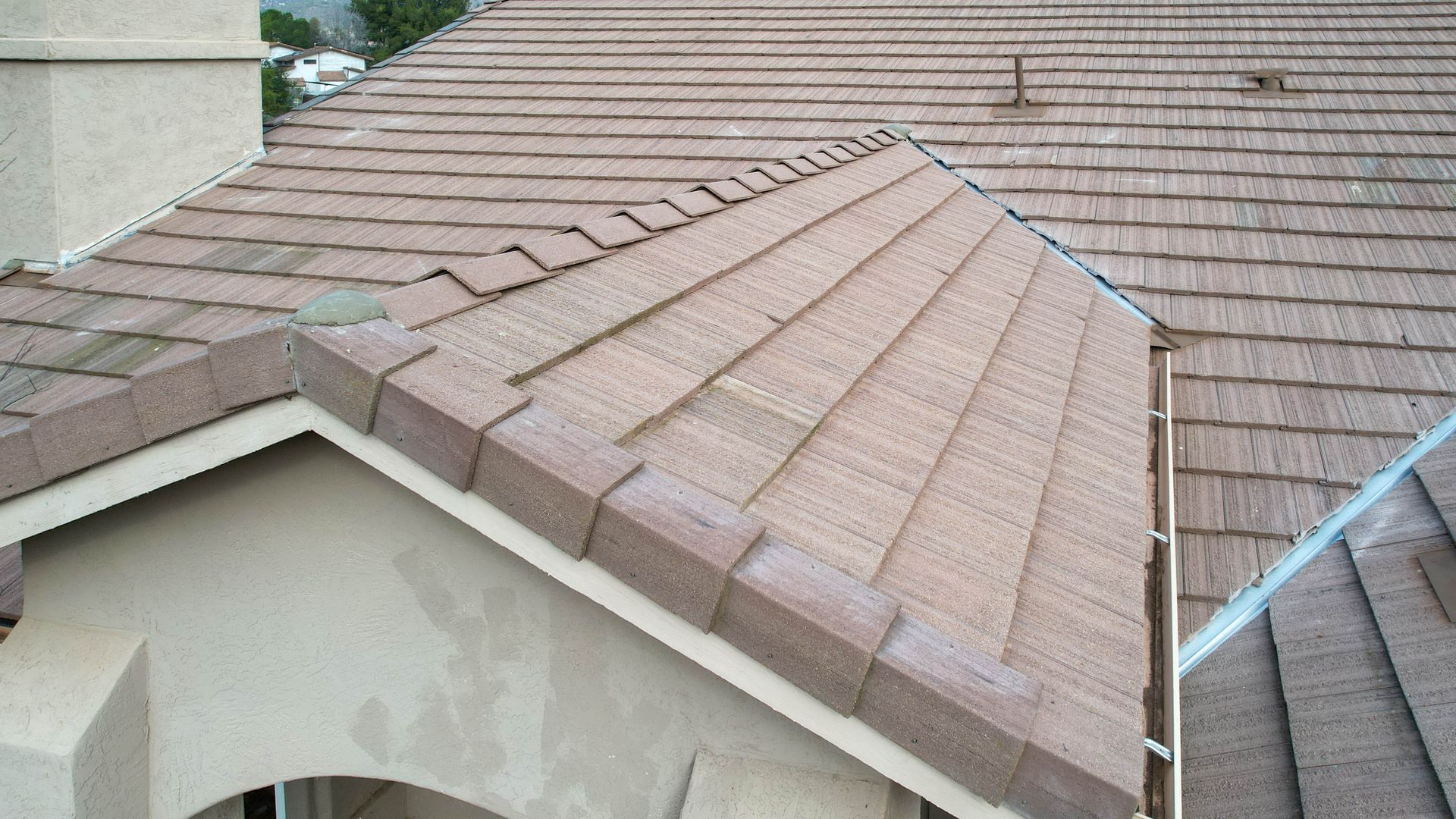 A close up of a roof with shingles on it